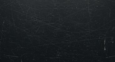 A black background with scratches and scratches photo