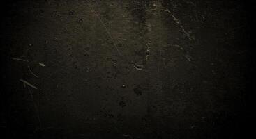oscuro grunge textura antecedentes con algunos arañazos y suciedad foto