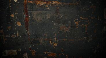 A black and white photo of a wall with peeling paint
