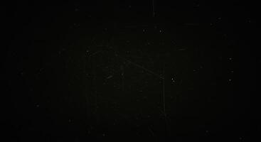 A black background with a white light photo