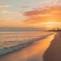 A beautiful sunset on the beach with waves and palm trees photo