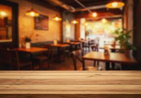 Wood table top over restaurant interior with blurred background photo