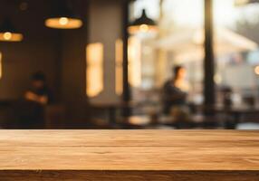 Wooden table top in front of a coffee shop photo