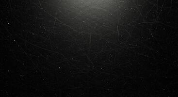 Black background with a light shining through it photo