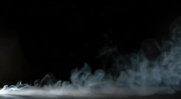 A white light is shining through smoke photo