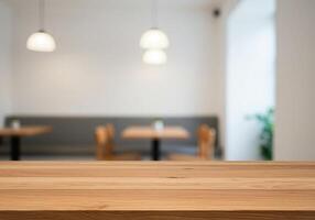 Empty wooden table in a restaurant with wooden chairs photo