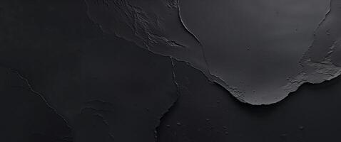 A black wall with a crack in it photo