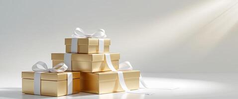 Stack of gold boxes with bows on top of each other. photo
