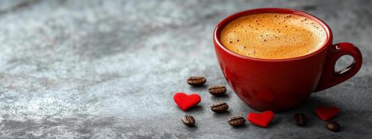 A red coffee cup with a heart on it sits on a table with coffee grounds and a heart-shaped sugar cube photo