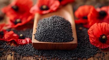 Black seeds on wooden spoon with poppies. Black seeds are arranged on a wooden spoon surrounded by vibrant red poppy flowers, creating a striking natural display. photo