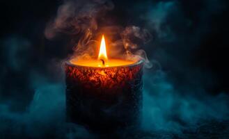 Elegant candle flame in dark ambiance. A warm candle flame flickers in a dimly lit environment, surrounded by gentle wisps of smoke, creating a cozy feel. photo