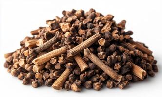 Cloves unique spice texture. Cloves are arranged in a mound, displaying their distinct shapes and rich brown color, perfect for culinary use. photo