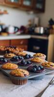 A tray of muffins on a table photo