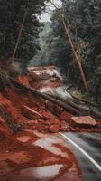 A road that has been washed out by a landslide photo
