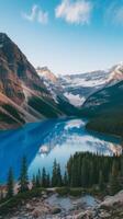 The beautiful blue lake in the mountains of banff photo