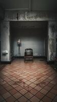 An empty room with a chair and a lamp photo