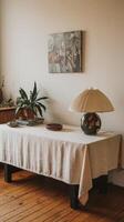 A table with a lamp on it photo