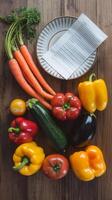 Vegetables and a paper with a recipe on it photo