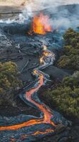 Lava flowing into the ocean from a volcano photo