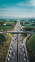 Aerial view of highway with cars driving on it photo
