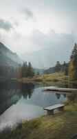 A lake with a bench and a dock photo