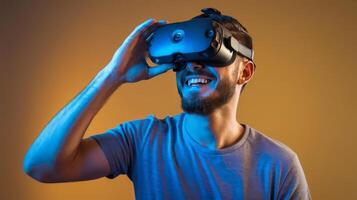 Portrt of happy gamer brunette man with beard in tshirt wearing vr headset playing virtual reality game with smile on his face innovative technology studio shot isolated on orange background photo