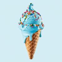 Blue ice cream cone with sprinkles on top photo