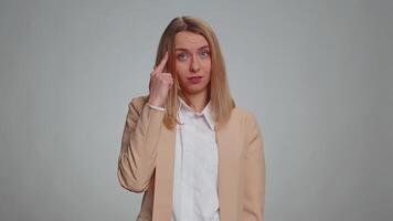 Business woman pointing at camera and showing stupid gesture, blaming some idiot for insane plan video