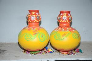Two large vases with colorful designs on them photo