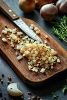 Chef chopping onions and herbs on wooden cutting board.. photo