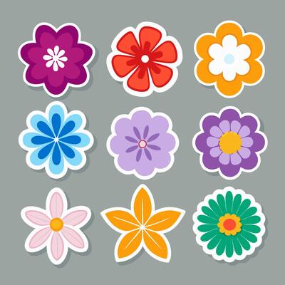 Various Colorful Flower Stickers Arranged on a Solid Gray Background