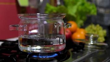 Eggs Boiling In Glass Pot For Easter. Breakfast Healthy Food. Chicken Eggs Boiled In Boiling Water On Stove. Protein Nutrition. Saucepan With Boiled Egg For Easter. Diet Breakfast Soft-Boiled Eggs Eat video