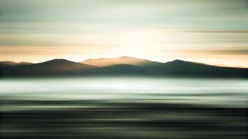 An abstract photograph of mountains and water photo