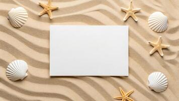 A blank note card surrounded by shells and starfish photo