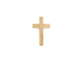 A simple, elegant ash cross on a pure white surface, emphasizing purity and renewal photo