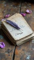 Old Book with Feather and Text I Love You on a Wooden Background photo