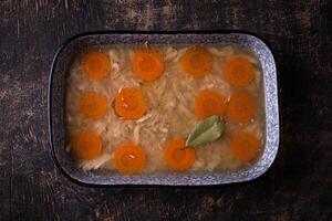 Aspic with chicken meat and carrot photo