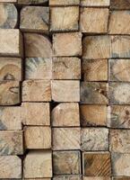 Stack of Wooden Planks in Construction Warehouse for Building Projects photo