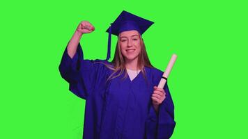 Graduated student flexing biceps with diploma on green screen video