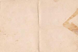 Brown old paper texture. Folded parchment paper sheet background with space for text. Vintage worn paper texture vector
