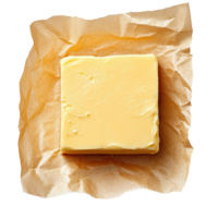Block of Unwrapped Yellow Butter on Brown Parchment Paper for Culinary and Food Photography Needs png