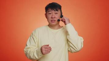 Man wearing headset freelance worker, call center, support service operator helpline communication video