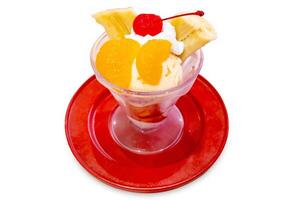 Parfe Fruit and ice cream on red plate photo