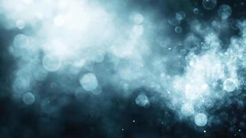 Ethereal blue abstract background with soft glowing particles and mist photo