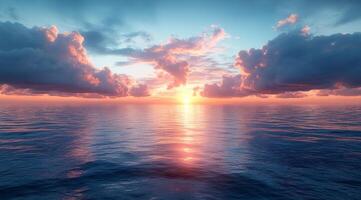 Sunset over the ocean with clouds photo