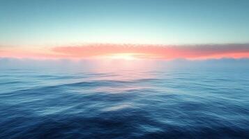 A beautiful sunset over the ocean with clouds photo