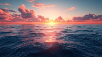 A sunset over the ocean with clouds and water photo