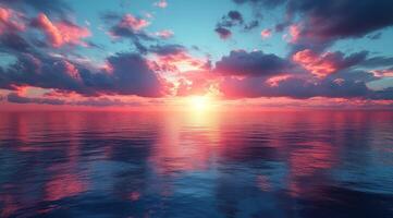 Sunset over the ocean with clouds and water photo