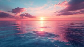 Sunset over the ocean with clouds and water photo