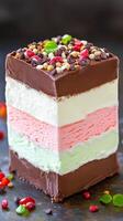 Colorful Layered Ice Cream with Chocolate and Sprinkles Delight photo